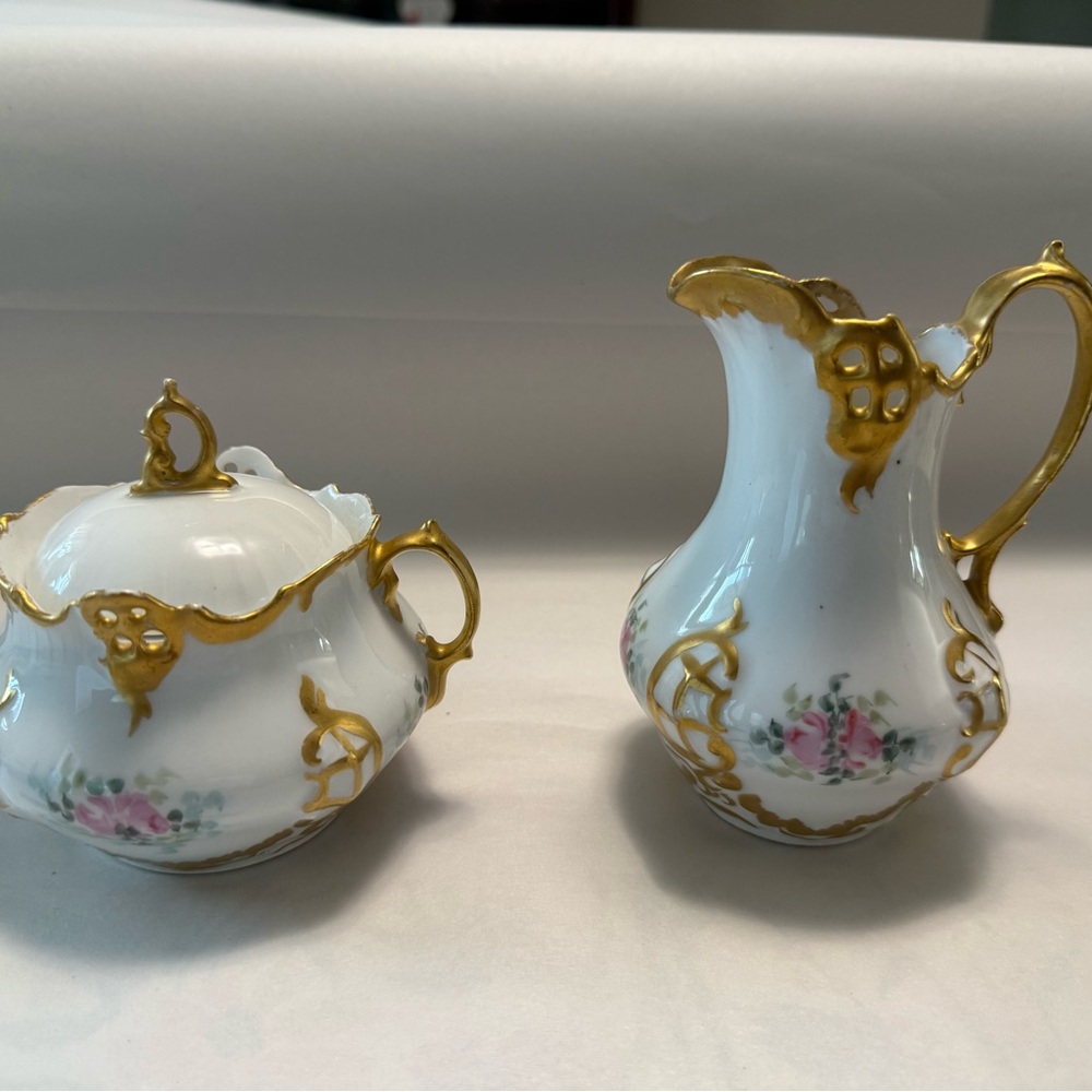 Elegant White and Gold Porcelain Set